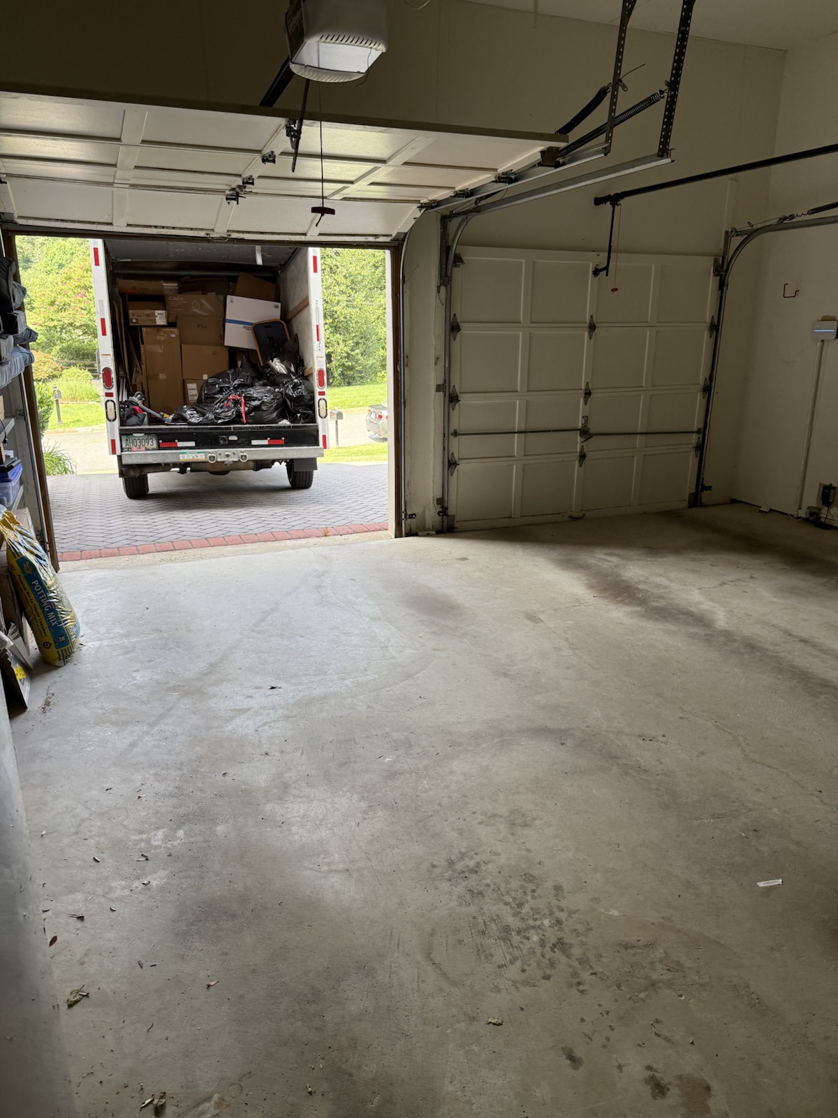 Empty garage after a NewPath Junk Removal cleanout in Alexandria, VA