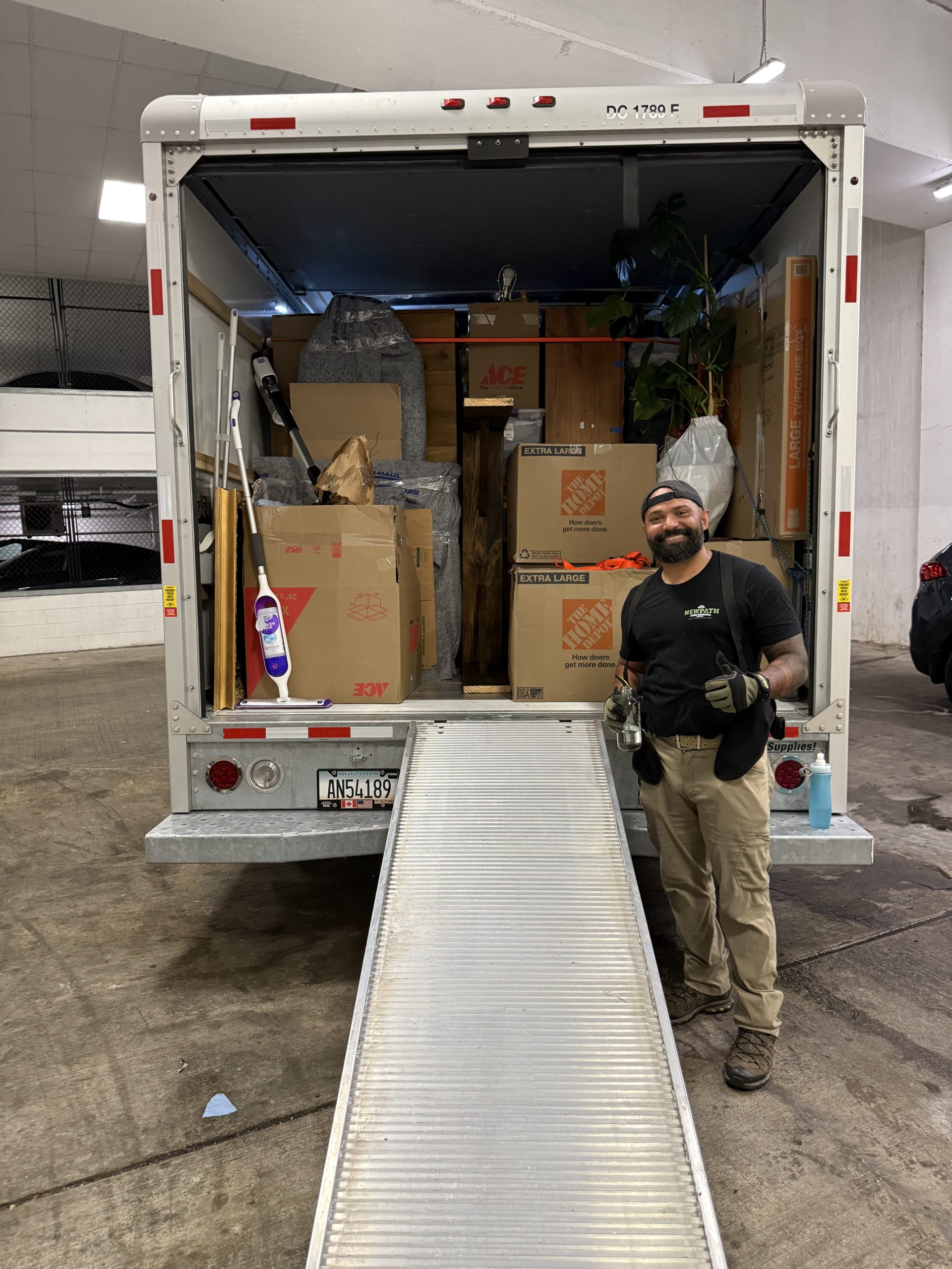 Carlos Medina with a loaded box truck after a small move in Northern Virginia